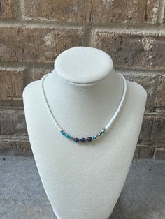 Lapis and turquoise beaded necklace with white seed beads and pyrite accents. White Seed Bead Necklace, Turquoise Beaded Necklace, Turquoise Bead Necklaces, Crystal Lake, Seed Bead Necklace, Genuine Turquoise, Turquoise Beads, Name Necklace, Bead Necklace