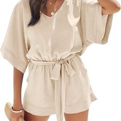 100% Polyester Pull On Closure Material: Breathable, Lightweight And Soft, Comfy To Wear Features: Rompers For Women Dressy Summer/ Casual V Neckline Short Jumpsuit/ Flowy Half Bell Sleeve/ Cutout Keyhole Back/ High Waist With A Self Tie Belt/ One Piece Playsuit With Short Pants And Side Pockets/ Loose Fit/ Solid Color Chic V-neck Relaxed Fit Jumpsuits And Rompers, Beige V-neck Jumpsuit For Day Out, Chic Vacation Jumpsuits And Rompers With Tie Waist, Summer Vacation Jumpsuits And Rompers With Belt, Summer Brunch Jumpsuits And Rompers With Elastic Waistband, Summer V-neck Jumpsuits And Rompers With Elastic Waistband, Summer Beige V-neck Jumpsuits And Rompers, Summer Short Sleeve Jumpsuits And Rompers With Elastic Waistband, Summer Beige Jumpsuits And Rompers With Elastic Waistband