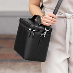 Here’s a compact, portable and versatile organizer that lets you take just about everything you need for a productive day in or out of the office. Crafted in our durable leather alternative, this zip-secure portable caddy fits books, junior-size notebooks, journals, iPad Air or small tablet within its roomy interior—and there’s a removable dividing organizer that holds pens, eyeglasses and office supplies. On your desk, this caddy functions as a perfect organizer, or you can take your essentials Portable Black Cases For Organization, Black Portable Cases For Organization, Black Travel Accessories With Luggage Sleeve For Organization, Modern Black Organizers For Home Organization, Modern Rectangular Travel Accessories, Rectangular Travel Accessories With Zipper Closure For Organization, Modern Portable Organizers For Everyday Use, Black Travel Organizer In Rectangular Case, Modern Portable Organizers For Everyday