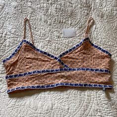 Never Worn Urban Outfitters Bralette Spring Beach Crop Top With Built-in Bra, Spring Beachwear Crop Top With Built-in Bra, Spring Casual Cropped Bra, Cropped Summer Loungewear Bra, Summer Bra-friendly Crop Top For Loungewear, Casual Spring Bra, Summer Loungewear Triangle Crop Top, Summer Triangle Crop Top For Loungewear, Beach Crop Top Camisole With Built-in Bra