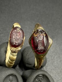 The Lot of Total 2 Beautiful Bronze Ring With Unique Intaglio Seal Stamp Engraved (Carved)On Garnet Stone A Human Figure Probably From Ancient Achaemenid Empire Civilizations. Originated From Central Asia. The Ring Intaglio Is Imprinted On Wet Clay For Better View In The Pictures . Rare Ancient Bronze Jewelry Ring . Best Item For Collections and Study . Fast and Free Shipping World Wide. Ancient Ceremonial Hallmarked Jewelry, Ancient Ceremonial Jewelry, Traditional Carved Ceremonial Rings, Oval Ceremonial Carved Jewelry, Traditional Carved Rings For Ceremonial Occasions, Ancient Style Carved Rings Gift, Antique Intaglio Ceremonial Jewelry, Antique Ceremonial Intaglio Jewelry, Antique Intaglio Jewelry For Ceremonial Occasions