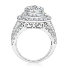 a white gold engagement ring with an oval center surrounded by round diamonds