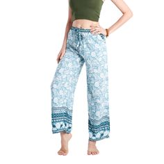 Handmade in Thailand 100% Natural Rayon Model is wearing Palazzo Pants in size M/ONE SIZE Machine wash in cold water for best results Our Palazzo Casual Pants are made with UltraSoft Rayon and have a large bow drawstring and lose leg bottoms. They come in a collection of boho prints and florals. This line is currently sold in M/ONE SIZE only. The pants are handmade and very light and comfortable to wear, especially in warm climates as the material breathes well. Perfect for lounging and great fo Comfortable Blue Spring Pants, Comfortable Blue Pants For Spring, Bohemian Blue Straight Leg Pants, Comfortable Blue Drawstring Pants, Casual Blue Wide Leg Harem Pants, Blue Wide Leg Harem Pants For Loungewear, Bohemian Wide-leg Drawstring Pants, Bohemian Wide-leg Pants With Drawstring, Ankle-length Blue Harem Pants For Vacation