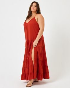 Easy + effortless, the Goldie Cover-Up is ready for the resort. This tiered maxi dress is unlined and features a low scoop back so it's perfect for wearing over your swimwear. Tiered Maxi Cover Up Dress Unlined Low Scoop Back Adjustable Slider Straps V Neckline Leg Slit Size XS/S, M/L 100% Cotton Like all delicates, shape, color and fit are best preserved if hand washed in cold water. Lay flat to dry. Style # GOLCV24 Model Measurements: Taelor, size S - Height 5'9, Bust 32", Waist 23", Hips 34 1 Iconic Dresses, Tiered Maxi Dress, Cover Up Dress, Model Measurements, Lay Flat, New Product, Cold Water, Fitness Models, Cover Up