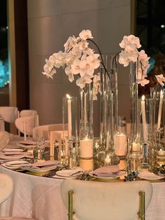 Wedding 
Wedding centrepiece 
Orchid 
Orchids 
Orchid centrepiece 
Candles 
Wedding candles White Orchid Wedding Table Decor, Orchid And Candle Centerpieces, Orchids Table Decor, Orchids Centerpiece Wedding, Modern Candle Centerpieces, Orchid Table Centerpiece, Simple Flower Centerpieces, Orchid Centrepiece