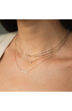 A 14-karat gold pendant that spells out the word 'Mama' anchors the slender chain of a delicate handcrafted necklace. 14" length; 2" extender; 1/8"W x 1/2"L pendant Spring-ring closure 14k gold Made in the USA Minimalist Name Necklace Gift For Mom, Gold Birthstone Necklace With Cable Chain In 14k Gold, Gold 14k Birthstone Necklace With Cable Chain, Elegant Everyday Name Necklace With Cable Chain, 14k Gold Cable Chain Name Necklace, Minimalist 14k Gold Name Necklace With Cable Chain, 14k Yellow Gold Name Necklace With Clavicle Chain, 14k Yellow Gold Clavicle Chain Name Necklace, Sterling Silver Yellow Gold Name Necklace With Cable Chain