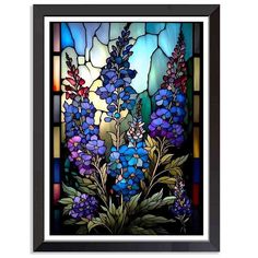 a stained glass window with flowers in it