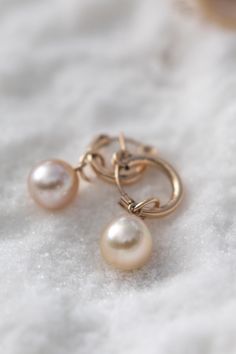 These elegant, creamy South Sea Pearl earrings, destined to become your most cherished pearls. Classy yet casual, they boast a beautiful champagne color that complements any occasion. Their slight oval shape ensures each pair is unique, making them extra special - just the way it should be. Suspended on, thick real  14 k gold fill hoops with a secure clip-back closure. Please note that each pearl and shell are inherently unique. While I strive to carefully match them to the ones depicted in the images, variations may naturally occur due to their individual characteristics. Because each piece of jewelry is handmade with care, please allow time for shipping Elegant Beige Teardrop Earrings, Elegant Beige Teardrop Jewelry, Champagne Jewelry, South Sea Pearls Earrings, Gold Filled Hoops, Sea Pearl, Light Academia, South Seas, Sea Pearls