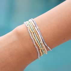 Start your stack with one or more of these super dainty 2mm gemstone stretch bracelets.  They layers together for a trendy casual look or pair one with others pieces for a fun stack. These little bracelets are paired with either 14k gold-filled beads - resistant to tarnish or genuine sterling silver.  See options in drop-down.  WATERPROOF! These bracelets are hand-strung using high quality, Grade A or semi-precious gemstones. Delicate Stackable Everyday Beaded Bracelets, Delicate Stackable Beaded Bracelets For Everyday, Dainty Adjustable Bracelets For Layering, Trendy Stackable Stretch Bracelet, Trendy Stackable Wrap Bracelet With Round Beads, Dainty Beaded Bracelets With Tiny Beads For Everyday, Dainty Everyday Beaded Bracelets With Tiny Beads, Dainty Stackable Beaded Bracelets For Layering, Adjustable Dainty Stretch Bracelet