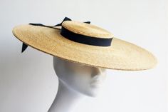 "Montpellier Beau Fine Natural Straw Boater Hat. Timeless, refined, old style glamour. Luxurious Straw Hat in natural, handcrafted in premium quality fine grade Milan braided straw. Extra wide (18\" inch) brimmed hat, with classic silhouette and shallow crown, hand finished steel wired edge, decorated with long trailing chichi dark navy ribbon. Appropriate wear for all of your most important dressy occasions, Mother of the Bride, Diner en Blanc. Secures with millinery elastic/ metal headband opt Royal Ascot Ladies Day, Ascot Ladies Day, Straw Boater Hat, Navy Ribbon, Straw Boater, Couture Hats, Bride Hat, Boater Hat, Metal Headbands