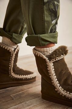 Coziest soft sheepskin boots featuring a shearling lining and crochet stitching in a mid-calf rise.* Pull-on style* Soft sole