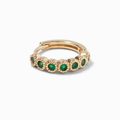 They'll be green with envy when they see you in this faux emerald cartilage earring. It has a gold-tone design that is accented by bezel-set faux emeralds in a clicker design. Finish: Gold-tone Size: 18G/1.0mm Closure: Clicker hinge Material: Metal - Claire's Gold 18G Emerald Cartilage Clicker Earring Hypoallergenic 14k Gold Green Jewelry, Hypoallergenic Green 14k Gold Jewelry, Gold Emerald Huggie Earrings For May Birthstone, Green Huggie Earrings For May Birthstone, May Birthstone Huggie Earrings, Trendy Green Stackable Jewelry, Green Gemstone Small Hoop Jewelry, Hoop Jewelry With May Birthstone, May Birthstone Gemstone Huggie Jewelry