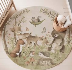 a rug with animals and birds on it in the middle of a flooring area