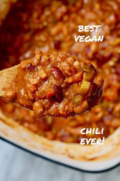 a spoon full of chili and beans with the words best vegan written above it