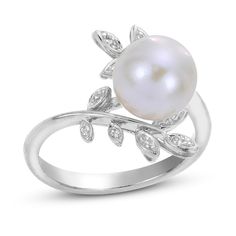 A stunning freshwater cultured pearl is orbited by shimmering accents of natural white topaz gemstones in this exquisite women's ring, crafted in lustrous sterling silver. White Gold Pearl Ring With Center Stone, Silver Akoya Pearl Rings With Diamond Accents, Silver Pearl Rings With Diamond Accents, Silver Rings With Diamond Accents And Pearl, Elegant Silver Pearl Ring With Center Stone, Silver Pearl Ring With Center Stone Fine Jewelry, Fine Jewelry Silver Pearl Ring With Center Stone, Fine Jewelry Silver Pearl Ring With Diamond Accents, Silver Akoya Pearl Ring In Fine Jewelry Style