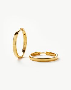 Classic Flat Medium Hoop Earrings | 18ct Gold Plated Vermeil. Introducing Our Lightest Ever Hoops — an Elevated Collection of Everyday Essentials that are Anything but Basic. An Upgrade on a Classic Silhouette, these Flat Surfaced Hoops Have Been Handcrafted to Become Your New Core Staples. Plus, they Feature a Hidden Hinge for a Seamless Closure. Wear Solo or Style with Studs and Mini Hoops for an Instant Ear Stack. Also Available in Small. Metal: 18Ct Recycled Gold Plated Vermeil on Recycled S Gold And Silver Earrings, Icon Jewelry, Medium Hoop Earrings, Ear Stack, Star Earrings Stud, Demi Fine Jewelry, Pearl Pendant Necklace, Gold Price, Enamel Jewelry