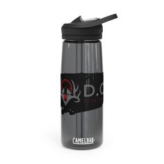 the camelbak water bottle has a black lid and is holding a straw in it's mouth