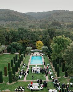 an aerial view of a formal dinner in the garden