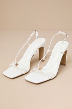 We're obsessed with elevating our chic 'fits with the Billini Rayla White Strappy Slingback High Heel Sandals! These luxe heels have a smooth, faux leather construction that shapes a trendy square footbed and a single sole silhouette. The strappy upper boasts a cinching, textured gold detail at the center that supports an adjustable, slingback-style strap with a gold buckle. Blade heel completes the sleek look. Available in whole sizes only. 3. 5" wrapped blade heel. Cushioned insole. Rubber sol White Strap Heels, White Heel Sandals, Heels Classy Elegant, Chic Fits, Outfit Reference, Trendy Heels, White Sandals Heels, Strappy High Heels, Heels Classy