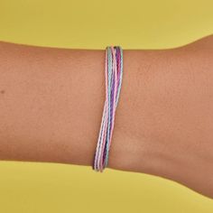 It’s the bracelet that started it all. Each one is handmade, waterproof and totally unique— in fact, the more you wear it, the cooler it looks. Grab yours today to feel the Pura Vida vibes. WaterproofGo surf, snowboard, or even take a shower with them on. Easily AdjustableOne size fits all, easy to slip on and off. 100% waterproof- Wax-coated- Adjustable from approximately 2-5 inches in diameter- Because jewelry products are handcrafted by artisans, dimensions may vary from piece to piece Resizable Casual Wristband For Friendship, Casual Resizable Friendship Wristband, Casual Purple Bracelet For Everyday, Casual Everyday Purple Bracelets, Adjustable Trendy Wristband For Everyday Use, Adjustable Casual Wristband For Everyday, Adjustable Casual Everyday Wristband, Casual Adjustable Wristband For Everyday, Trendy Purple Friendship Bracelets