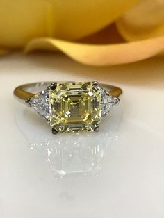 Canary Yellow Asscher Cut With Trillion Accents Engagement Wedding Anniversary Promise Ring 3.50ctw Solid 14kt White Gold #4843 Gia Certified Trillion Cut Cubic Zirconia Ring, Classic Trillion Cut Diamond Ring Gia Certified, Luxury Trillion Cut Cubic Zirconia Wedding Ring, Asscher Cut Yellow Gold Diamond Ring, Trillion Cut Diamond Promise Ring, Asscher Cut Diamond Rings With Side Stones, Formal Yellow Asscher Cut Diamond Ring, Yellow Asscher Cut Diamond Ring With Prong Setting, Asscher Cut Yellow Diamond Wedding Ring