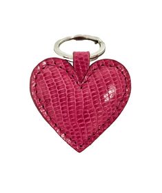 a pink heart shaped keychain on a white background