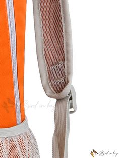 an orange and white backpack with straps attached to it