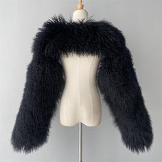 An interested cropped coat made of mongolian fur for the ultimate cool look to add to your wardrobe. Luxury Black Fur Coat With Feather Trim, Luxury Single-breasted Fur Coat For Winter, Luxury Black Faux Fur Outerwear, Mongolian Fur, Single-breasted Luxury Fur Coat, Cropped Coat, Luxury Long-sleeved Wool Coat With Faux Fur Trim, Modern Womens Fashion, Luxury Women