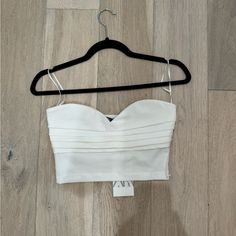 White Size Small Folded Detailing On Front Size Zipper Never Worn Fitted Bandage Chic Crop Top, Fitted Chic Bandage Crop Top, Party Bandage Crop Top, Elegant Fitted Bandage Crop Top, Summer Cropped Bandage Tops, Spring Party Bandage Crop Top, Spring Party Bandage Tops, Spring Fitted Bandage Crop Top, Cropped Bandage Tops For Party