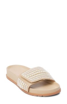 Pearly beads add an impeccably polished finishing touch to a sandal set on a contoured, arch-supporting footbed. 1 1/4" heel Adjustable hook-and-loop strap Contoured footbed with arch support Synthetic upper, lining and sole Imported Arch Support, Slide Sandals, Womens Sandals, Arch, Coconut, Nordstrom, Sandals, Luxury Fashion, Beads