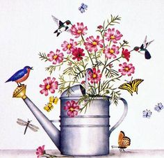 a watering can filled with pink flowers and butterflies