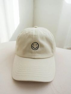 This dad hat is sure to bring a smile to your face! With its embroidered smiley design, it's a style sure to make a statement. Wear it proudly and show the world what kind of mood you’re in (hint: it's a happy one!). Embroidered Smiley Face, Smiley Design, Chocolate Wine, Clover Green, Dad Cap, Cream Roses, Dad Caps, Dress Home, Boutique Accessories