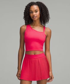 Serve more than a look. This tennis tank has a built-in shelf bra and all the performance properties to keep you at the top of your game. Designed for Tennis. Intended to provide medium support for B/C cups:Tight fit contours your body:Cropped length is cut above the waist-perfect with high-rise pants:Intended for medium-impact activities. Built-in shelf bra for added support and coverage. Pockets for optional, removable cups. Lululemon Bra With Adjustable Straps, Fitted Lululemon Bra, Fitted Lululemon Sports Bra, Fitted Versatile Lululemon Sports Bra, Lululemon Fitted Bra, Athleisure Tank Top With Built-in Padding For Pilates, Sporty Compressive Tank Top For Pilates, Versatile Activewear Tank With Built-in Bra, Athleisure Nylon Tank Top With Built-in Bra