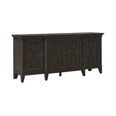 the sideboard has three doors and two drawers