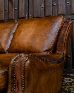 The exquisite Vaquero Western Leather Sofa combines timeless style and comfort, making it a top-of-the-line choice. Crafted with meticulous attention to detail and the finest leather, this sofa exudes elegance and sophistication. The hand-burnished leather has been carefully treated to achieve an aged patina, giving the piece a sense of character and history. The whip-stitched arms and brass nail head accents add a rustic touch while maintaining a modern design aesthetic. Inside and out, the Vaq Seating Booth, Adobe Interior, Western Candle Holders, Cowhide Furniture, Burlap Rug, Leather Throw Pillows, Sofa Leather, Leather Stool, Native American Pottery