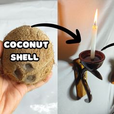 a hand holding a coconut shell next to a candle holder with two candles in it