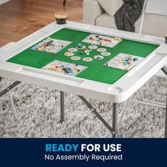 a game table with cards on it and the words ready for use no assembly required