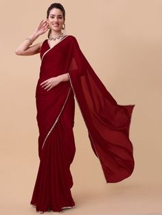 Maroon and gold-toned sareeSolid solid saree with embellished border borderHas mirror work detailThe saree comes with an unstitched blouse pieceThe blouse worn by the model might be for modelling purpose only. Check the image of the blouse piece to understand how the actual blouse piece looks like. Bridesmaid Hamper, Solid Saree, Indian Fits, Maroon Saree, Design For Wedding, Saree Sale, Satin Saree, Anarkali Suit, Mirror Work