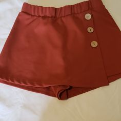 Got A Fairytale Wonderland Kinda Vibe With These. Dark Orange, Rust Colored With Wooden Button Details. Elastic Waistband, Size Small But Can Fit Larger. Never Worn! Pair With A Cure Crop. Great For Summer! No Tags. Accepting Offers! Fashion Nova Shorts, Shorts Fashion, Dark Orange, Rust Color, Fashion Nova, Rust, Womens Shorts, Elastic, Orange