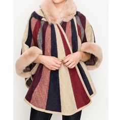 Fur Striped Hooded Poncho Is A One Size Poncho That Is Meant To Give A Relaxed Fit. It Is Super Warm And Feels Like You Are Wearing A Blanket To Break The Wind Chill. Made Out Of Acrylic. Cozy Multicolor Winter Cape, One Size Winter Cape, Winter Hooded Poncho One Size, Hooded Winter Poncho One Size, Multicolor Long-sleeved Winter Cape, Multicolor Long Sleeve Cape For Winter, Multicolor Long Sleeve Winter Cape, Beige Hooded Poncho For Fall, Winter Beige Poncho For Cold Weather