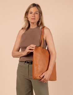 Model image of Georgia wild oak soft grain leather large shopper bag Chic Everyday Shoulder Bag In Vegetable Tanned Leather, Chic Everyday Vegetable Tanned Leather Shoulder Bag, Classic Vegetable-tanned Shoulder Bag For Shopping, Classic Vegetable-tanned Bags For Shopping, Chic Vegetable-tanned Shoulder Bag For Everyday, Chic Everyday Vegetable-tanned Shoulder Bag, Modern Vegetable Tanned Leather Shoulder Bag, Modern Shoulder Bag In Vegetable Tanned Leather, Large Shopper Bag