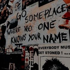 there is a sign on the wall that says go someplace where no one knows your name