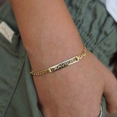 This beautiful handmade bracelet will feature your kid's initials, name or date in pretty font or your choice. Bracelet is unisex and can be worn by girl or boy. Great gift for baby shower, child birth, birthday, etc.Metal: *14K solid gold * 14K white goldBar length: 0.8" (24mm)Front of the bar can be engraved up to 10 characters for better visibility.Bracelet length: 6"If you need shorter size, please inquire.Chain type: curb.Chain with: 3mm-----HOW TO ORDER------* Write your desired personaliz Adjustable Nameplate Bracelet For Friendship, Adjustable Gold Bracelet With Custom Name For Personalized Gift, Personalized Adjustable Nameplate Gold Bracelet, Custom Name Nameplate Bracelet For Friendship, Adjustable Name Chain Bracelet For Personalized Gift, Personalized Nameplate Chain Bracelet, Everyday Nameplate Bracelet With Custom Name, Personalized Adjustable Chain Bracelet For Mother's Day, Personalized Adjustable Gold Bracelet For Everyday