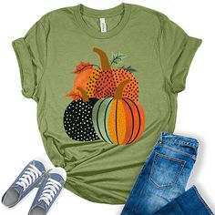 Style: Add some style to your wardrobe with our Fall vintage tees for women! These graphic tees for women are the perfect blend of style and comfort and are sure to add some fun and fashion to your attire. Quality: Our womens tops are designed and printed with love in the USA. We use high-quality inks on premium Bella Canvas Unisex vintage graphic tees for a bold and stylish look. Fabric: Crafted with a premium blend of 100% Airlume combed and ring-spun cotton, this unisex floral top is incredibly soft, lightweight, and breathable.  Perfect Fit: Our womens fall clothes come in a variety of sizes so you can find the perfect fit! Our floral tops for women come in sizes from XS - 4XL so everyone in the family can join in the fun! We do not pre-tie or roll our shirts. We leave that up to your Trendy Green T-shirt For Fall, Green Graphic Tee For Fall, Green Screen Print T-shirt For Fall, Cute Graphic Tees For Women, Fall Tshirt, Graphic Tees For Women, Pumpkin Thanksgiving, Autumn T Shirts, Fitted Sleeves