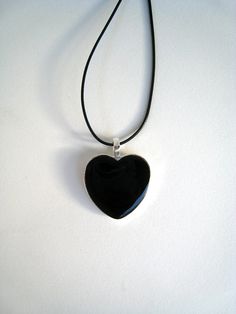 Black Heart necklace. Medium (1'') heart shaped pendant, silver plated. Custom color. Resin (liquid glass) Minimalist Black Heart Charm Necklace, Minimalist Black Heart Necklace, Black Heart Charm Pendant Jewelry, Black Pendant Jewelry With Heart Charm, Minimalist Black Heart Necklace For Valentine's Day, Black Heart-shaped Jewelry, Black Jewelry With Heart Charm Pendant, Black Heart-shaped Sterling Silver Necklace, Black Jewelry With Heart Charm