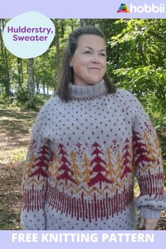 a woman standing in the woods wearing a sweater with trees on it and text overlay that reads, free knitting pattern