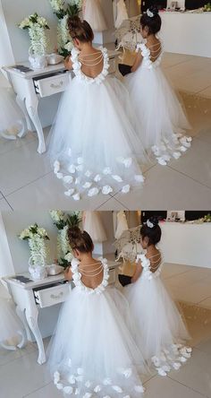 #flowergirldress@weddingdressforlittlegirl #littlegirldress #firstcommuniondress Fitted Wedding Dresses With Floral Design, Floral Tulle Dress For Garden Party, Fitted Floral Dresses For Dress-up, Spring Wedding Tutu Dress With Flower Shape, Flower Ball Gown, Dresses With Flowers, Dressed In White, Long Flower Girl Dresses