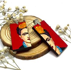 Frida Earrings, Mexican Inspired, Frida Inspired Earrings, Red Hand Painted Earrings, Red Wooden Earrings, Fridamania, Aretes Mujer, Wearable Art, Art to wear, Frida Jewelry, Mexican Jewelry, Mexican Folk Art, Women Earrings, Art-Wear Jewelry, Fridamaniacs Hey! Hello It's nice to have you around Welcome to our shop. ¡Bienvenidos Are you looking for a unique, colorful, stylish and cool gift for that special person out there or for yourself?   Well, let me tell you something. You're in the right place at the right timeWe have the most beautiful, original, uniquely designed, fashionable, handcrafted/hand painted gift ideas for you or that special Frida-fan you might know out there...  The listing is for a unique 100% Hand Painted Frida-maniacs earrings made from scratch. Every single element Artistic Red Earrings Gift, Artistic Red Drop Earrings, Hand Painted Gifts, Hand Painted Earrings, Painted Earrings, Mexican Jewelry, Mexican Artists, Mexican Folk Art, White Gift Boxes