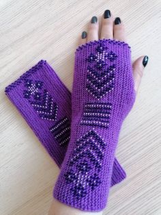 "Beautiful and comfy wrist warmers, handmade by me. These fingerless mitts are hand knitted, using soft light purple merino wool, colorful high quality Czech glass beads. The beads are knitted in, so they will not come out! They are knitted with love, care and patience. It is gorgeous accessory for spring, autumn and winter or may be used on cold summer eves. Goes perfectly with all kinds of clothing. It is perfect gift for any occasion. Size: 7.5\"/19 cm long.  Wrist size is 6\"- 7\"in / 15-17 Winter Gift Crochet Knitting Pattern, Winter Crochet Knitting Pattern For Gift, Nordic Style Handmade Winter Knitting Pattern, Winter Crochet Knitting Pattern, Handmade Purple Crafts For Crafting, Bohemian Handmade Winter Knitting Pattern, Handmade Winter Knitting Pattern For Crafting, Handmade Winter Knitting Pattern One Size, Handmade Winter Crafts For Gifts