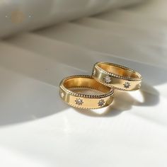 Gold Celestial Ring, Sun Rings, Water Proof Rings, 18K Gold Plated Jewelry, Celestial Simple Band, Gifts for Her, Celestial Jewelry, Gift. 💟 Material: Premium 316L Stainless Steel -18K Gold Plated. 💟 Gemstones: High-quality 3A Zircon Crystals 💟 Sizes: Available in US sizes 6, 7, 8 💟 Weight: Lightweight at just 3 grams 💟 Finish: Tarnish-free and hypoallergenic, ensuring long-lasting shine and comfort. 💫 Elegant Design: The classic gold finish paired with dazzling zircon crystals makes this ring a standout accessory. 💫 Durability: Made from high-quality stainless steel, it resists tarnishing and maintains its luster. 💫 Comfortable Fit: Lightweight and hypoallergenic, suitable for sensitive skin. 💫 Versatile: Perfect for everyday wear, whether at work, the gym, or a night out. Gold Couple Rings With Diamond Accents For Promise, Gold Celestial Diamond Ring, Gold Jewelry With Halo Design For Promise, Gold Halo Design Jewelry For Promise, Gold Celestial Rings For Anniversary, Celestial Style Gold Round Rings, Gold Halo Jewelry For Anniversary, Celestial Gold Rings With Diamond Accents, Celestial Gold Diamond Promise Ring